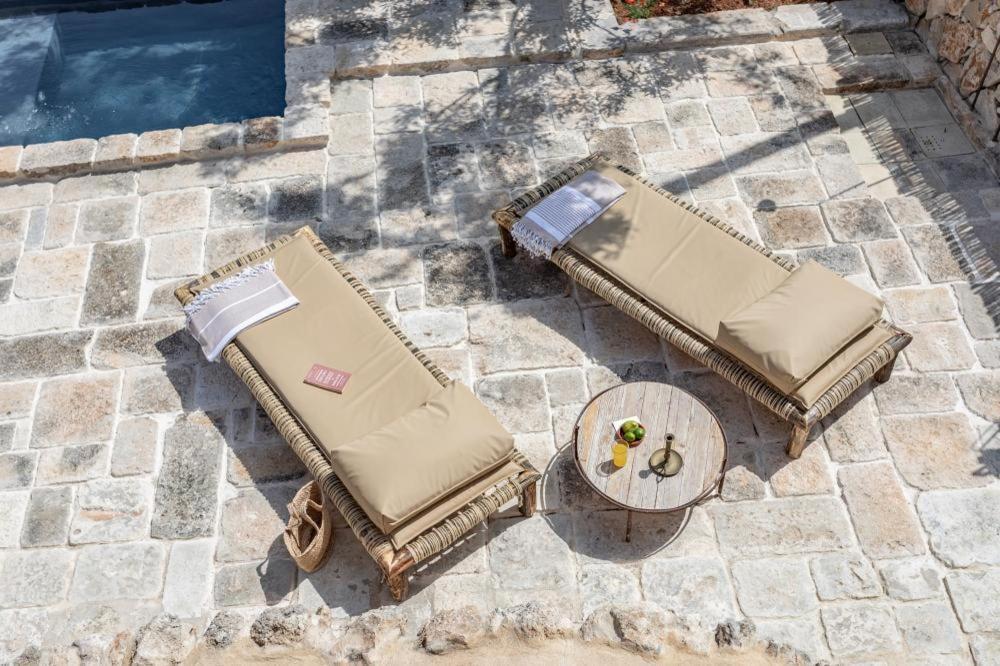 לינה וארוחת בוקר סנט'איזידורו Trullo Santovia מראה חיצוני תמונה